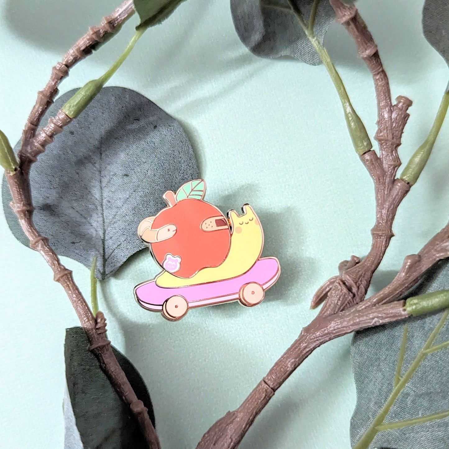 Snapple the Apple Snail Enamel Pin