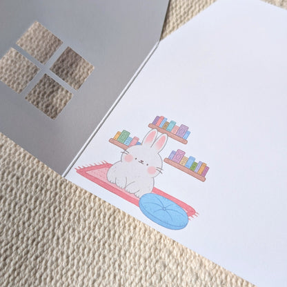 Greeting card with a rabbit design on a textured surface