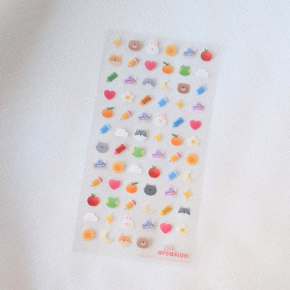 Sticker sheet with various colorful icons on a white background