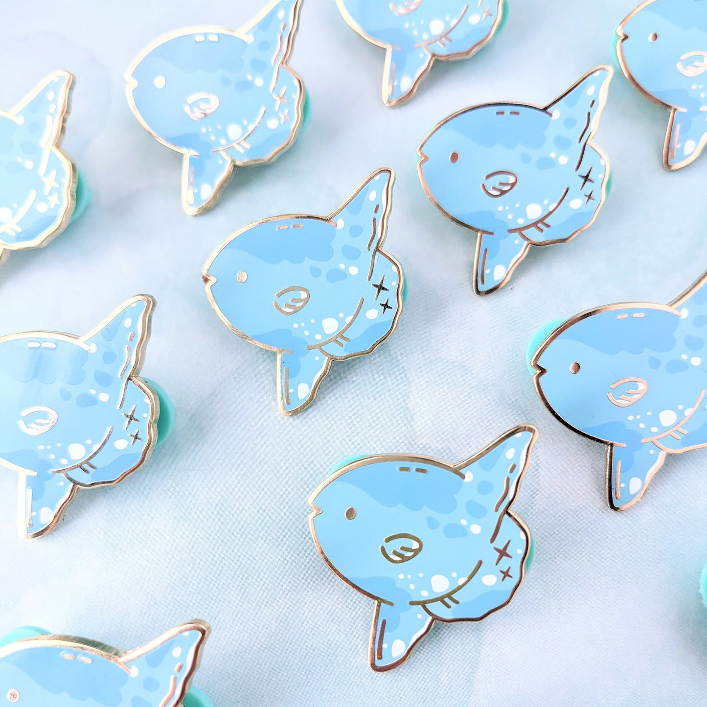 Of Sun and Sea–Mola Enamel Pin